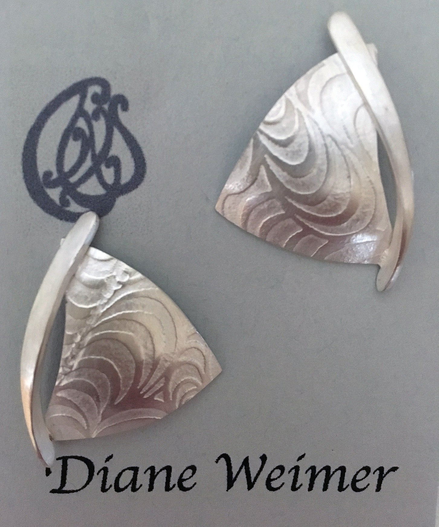 Silver wavy sailboat earrings, image